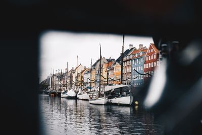 View of boats moored at harbor
