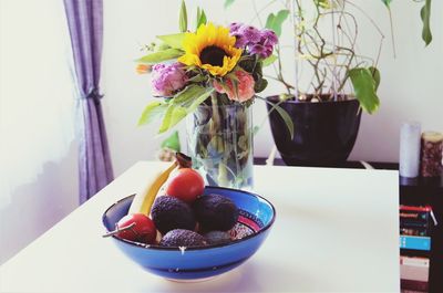 Close-up of potted plant in vase on table