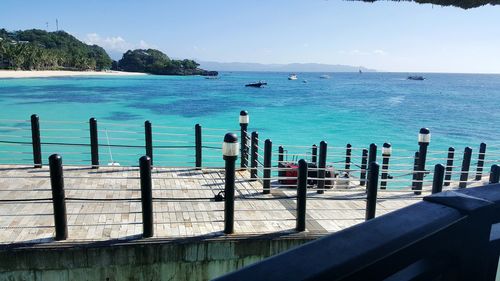 Scenic view of sea against blue sky