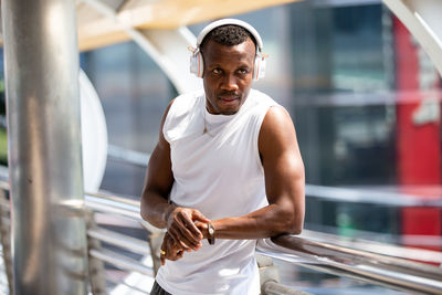 Portrait of young man standing outdoors