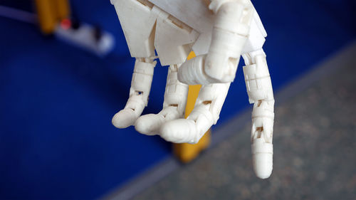 Close-up of white cyborg hand