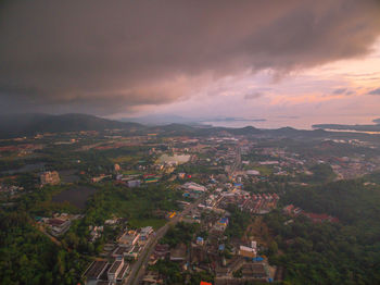 High angle view of townscape against sky during sunset