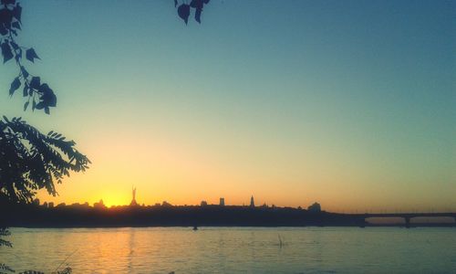 Scenic view of calm sea at sunset