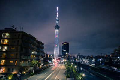 Illuminated buildings in city at night