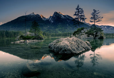 Scenic view of lake against sky during sunset