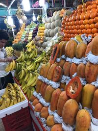 Various fruits for sale at market stall