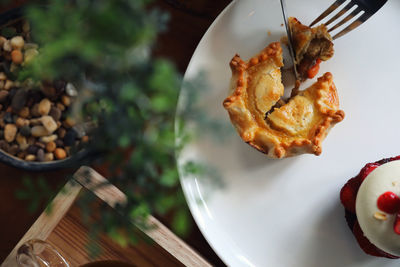 High angle view of tart in plate on table