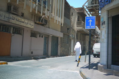 View of road along buildings