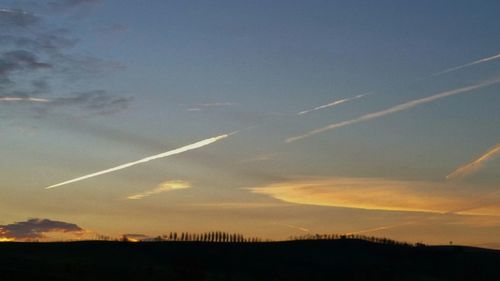 Scenic view of landscape at sunset
