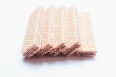 Close-up of chocolate cake against white background