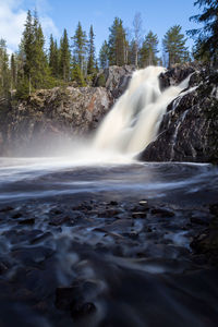 View of waterfall in forest