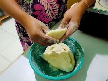 High angle view of woman preparing food