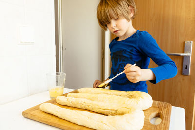 Midsection of girl holding food