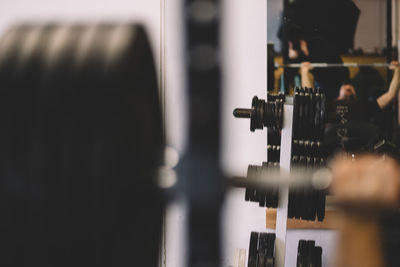 Reflection of man photographing in mirror