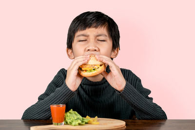 Portrait of a boy eating food