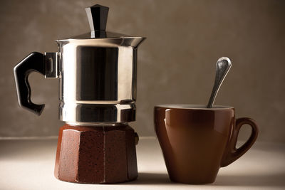 Close-up of coffee cup on table