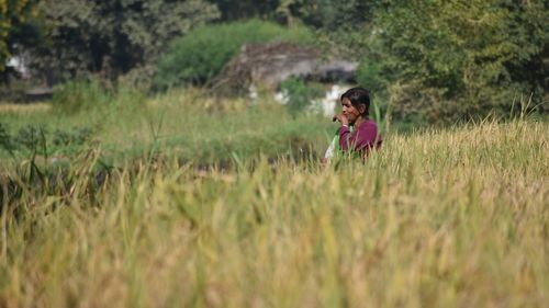 Woman on agricultural field