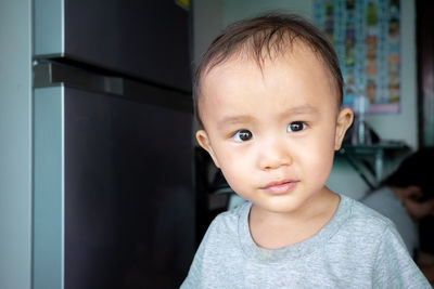 Portrait of cute baby at home