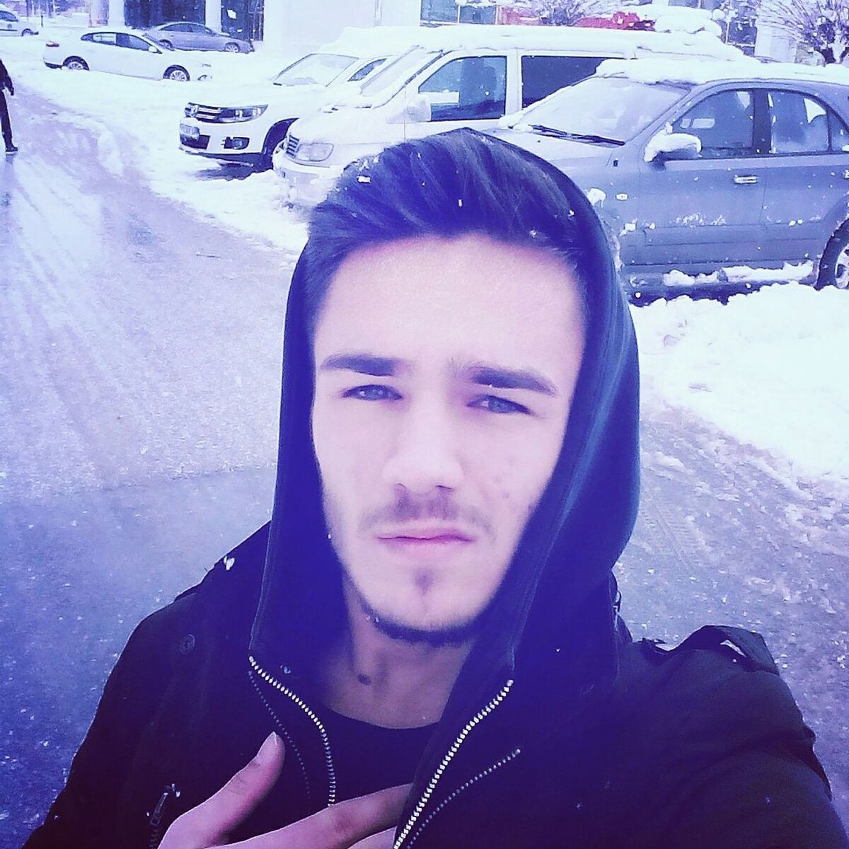 winter, cold temperature, snow, lifestyles, leisure activity, looking at camera, portrait, transportation, person, season, car, young adult, front view, mode of transport, headshot, land vehicle, day, covering