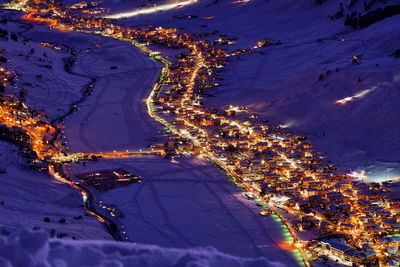 High angle view of illuminated trees on snow covered land