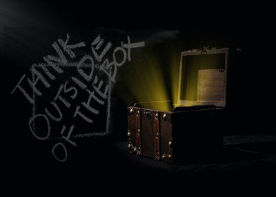 Close-up of text on table against black background