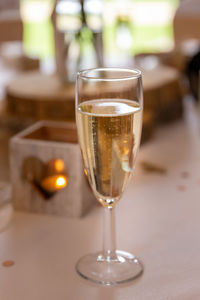 Close-up of wineglass on table