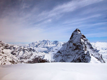 Mountains and white snowy landscape in the alps in winter