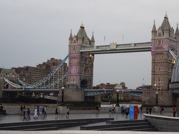 Group of people in city at bridge