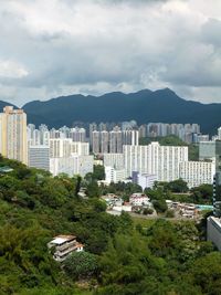 High angle view of townscape against cloudy sky