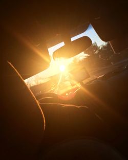 Close-up of man hand in car