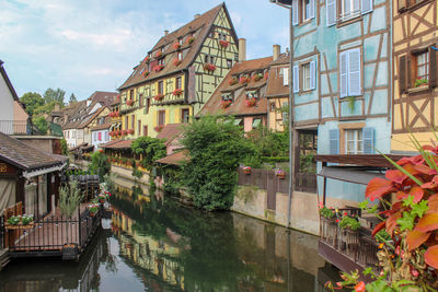 Canal amidst buildings in town