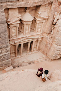 Man in front of historic building