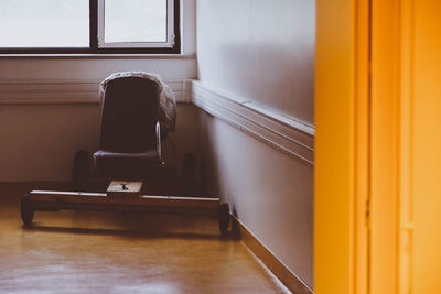 Empty chair in building