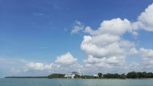 Panoramic view of blue sea against sky