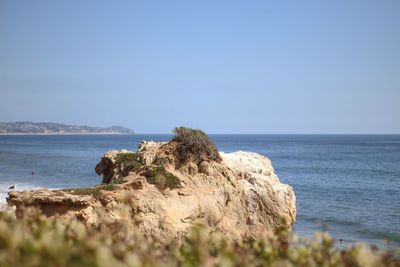 Scenic view of sea against clear sky