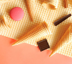 Waffles and macarons background 