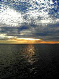 Scenic view of sea against sky at sunset