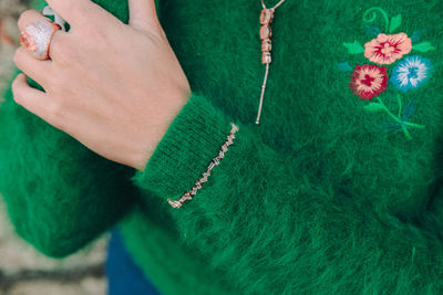 Close-up of woman hand with butterfly