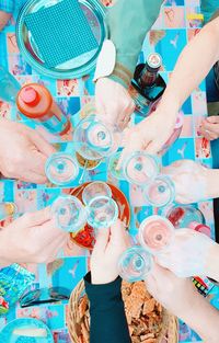 High angle view of people drinking glass