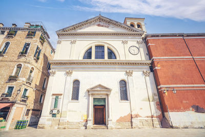 Low angle view of historic building against sky