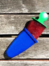 High angle view of blue umbrella on table