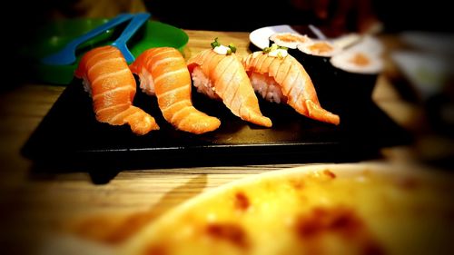 Close-up of sushi served on table