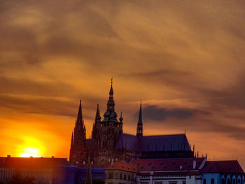 Buildings against sky during sunset