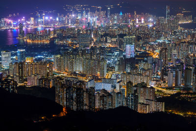 Illuminated city lit up at night