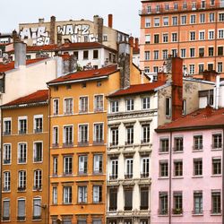 Low angle view of buildings in city lyon