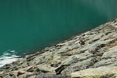 High angle view of rock formation on beach