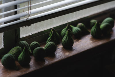 Close-up of figs on window sill