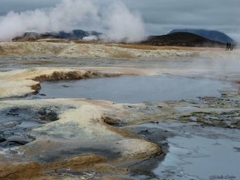 Smoke emitting from volcanic landscape