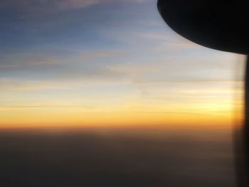 Scenic view of silhouette landscape against sky during sunset