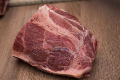 Close-up of meat on cutting board